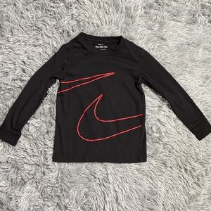 Nike Kids Black Tee with Red Swoosh Design